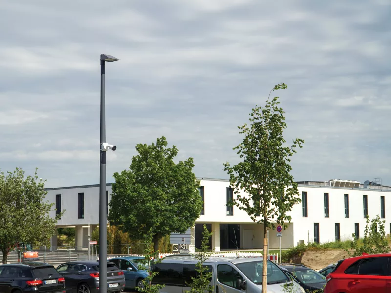 Polecam overlooking parking spots outside building