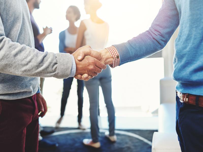 two people shaking hands