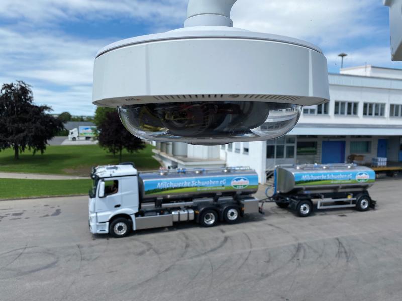 Camera overseeing truck leaving Milchewerke Schwaben