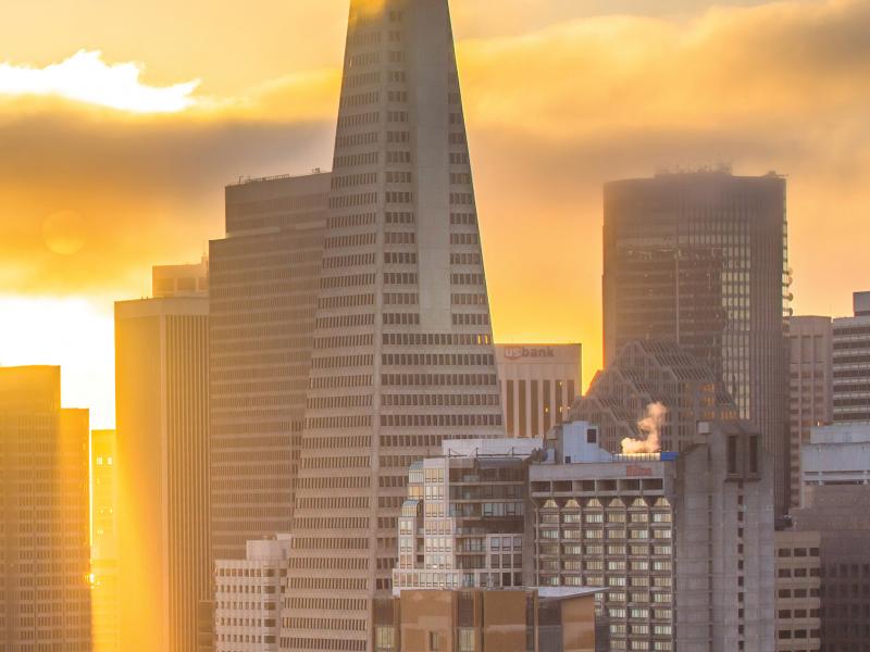 sunrise over buildings in san francisco