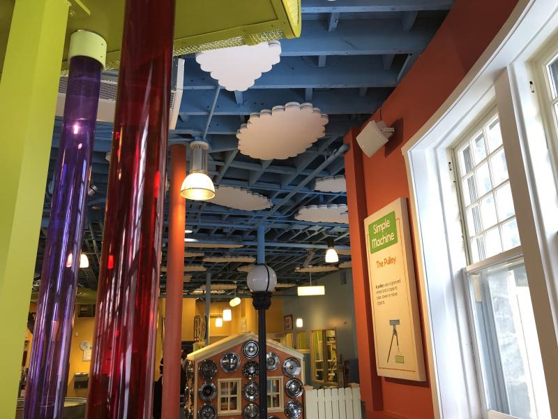 Cabinet speaker on wall of children's museum
