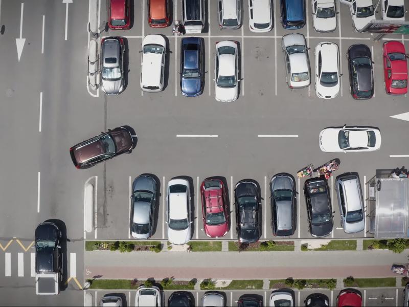 Parking lot from above with cars