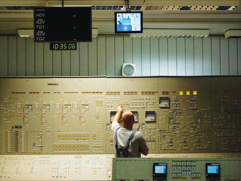 Man working on control board