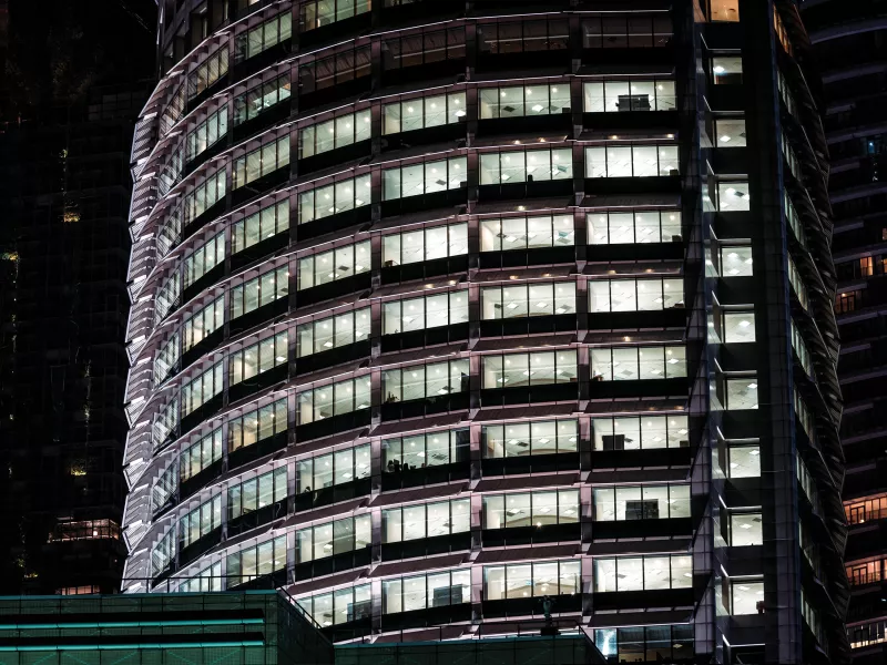 Scope office building exterior at night