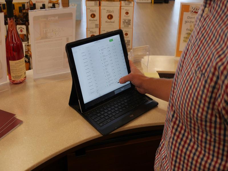 Person using AXIS Camera Station on tablet