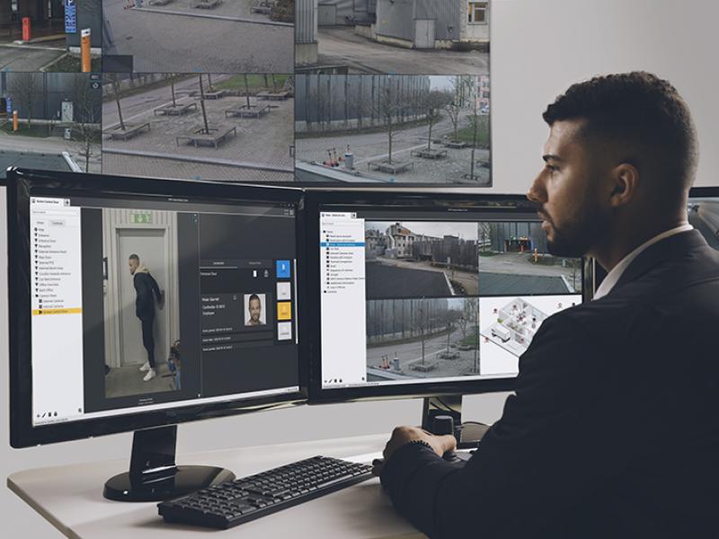 ACS operator working on computer screens