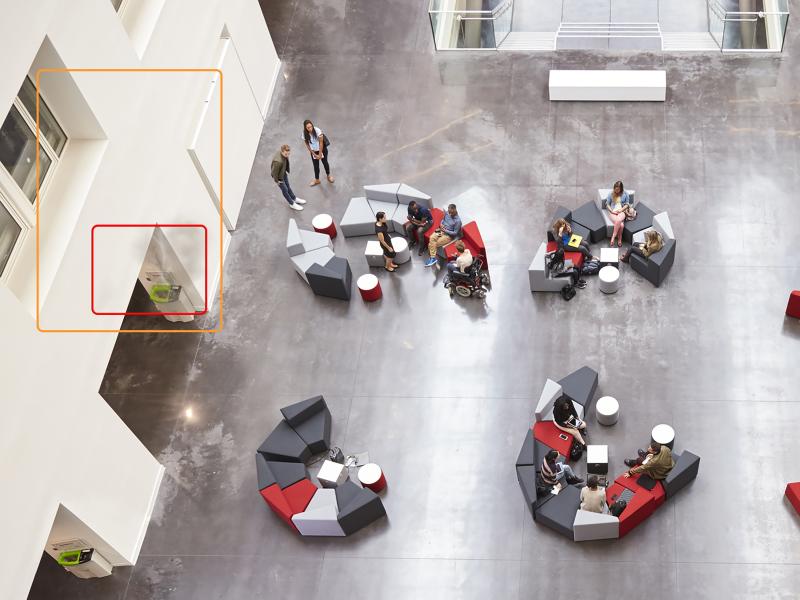 Camera view of lounge space with identified smoke