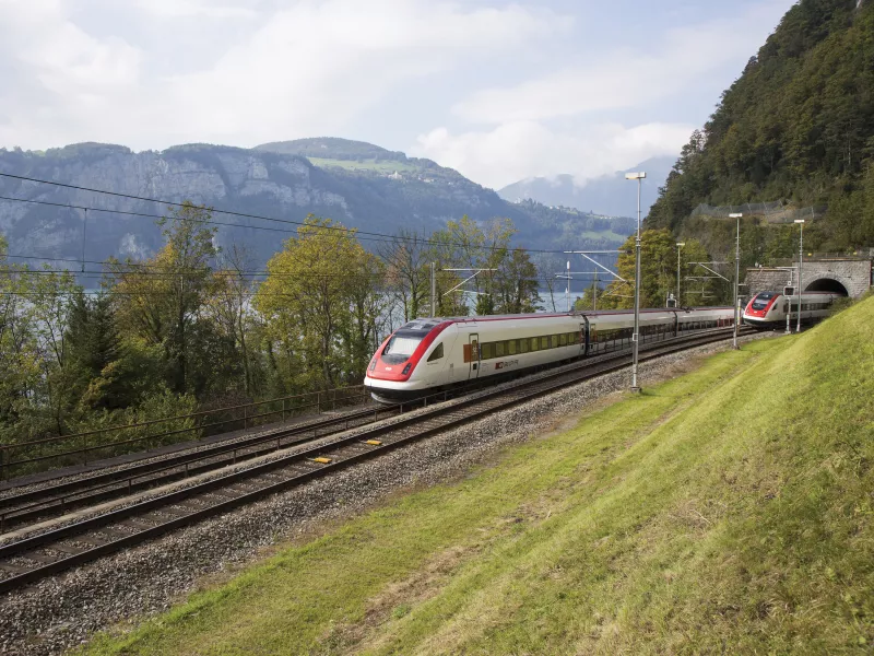 Train on railway with surrounding nature