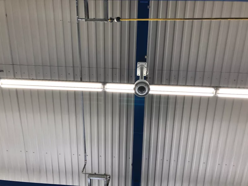 Ceiling camera in warehouse