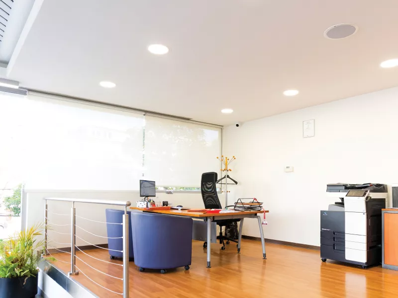 Office area with desk and printer