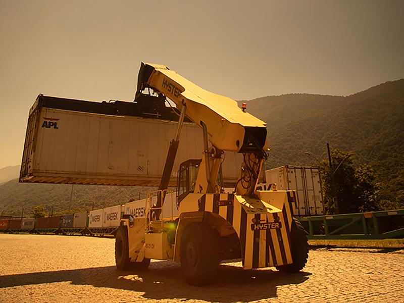 Crane vehicle with container