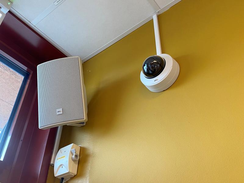 Camera and network speaker on wall