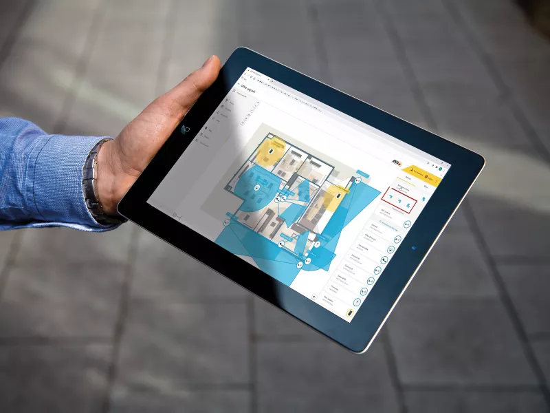 Hand holding ipad