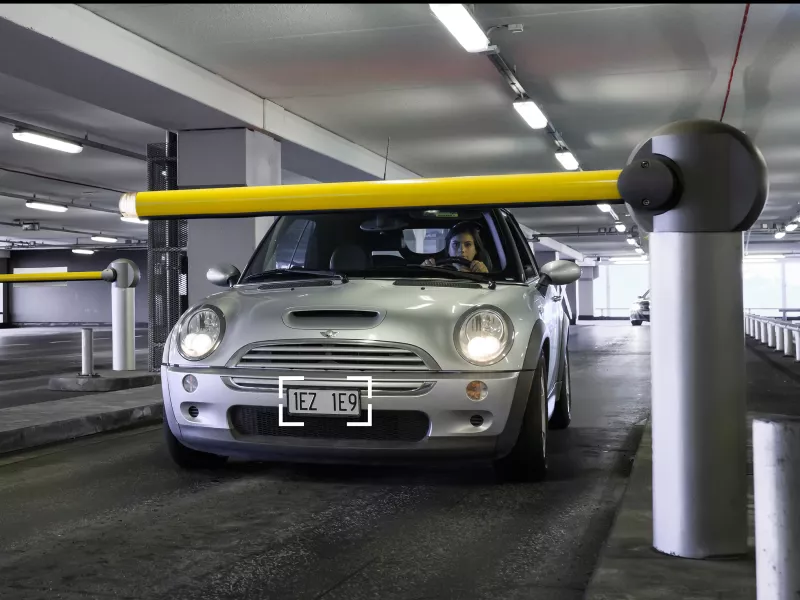 White car in a parking garage