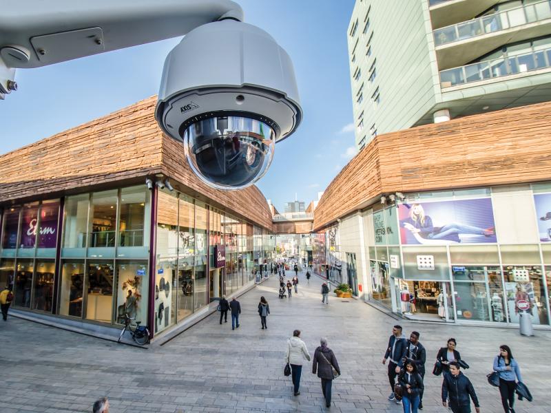 axis q60 IP camera mounted outside a shopping center