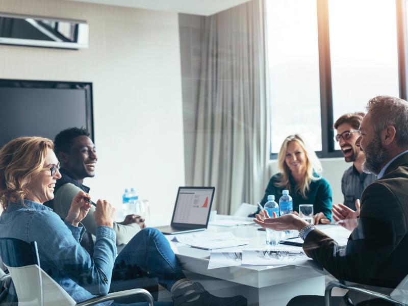 Group meeting with smiling people