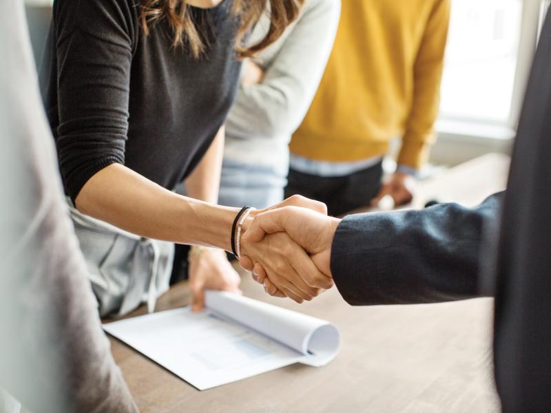 Women shaking hands