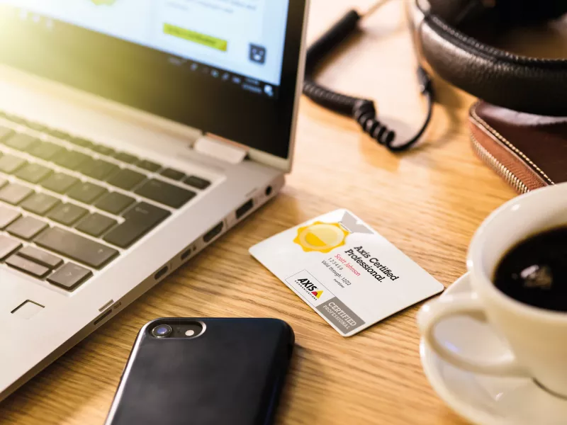 Axis certification card at a workstation