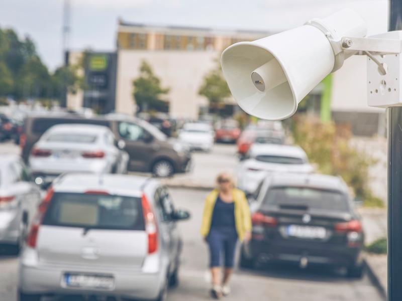 c1310e, mounted on a pole at a parking lot