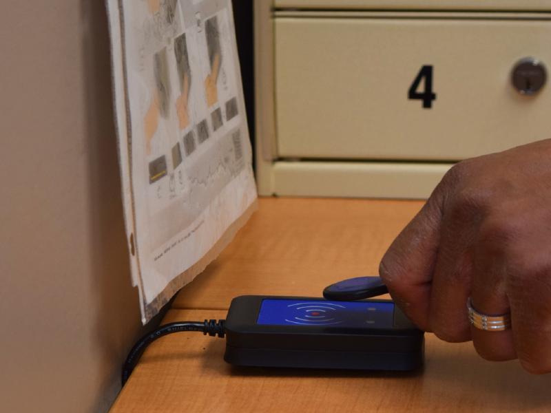 RFID card reader assigns officer a camera