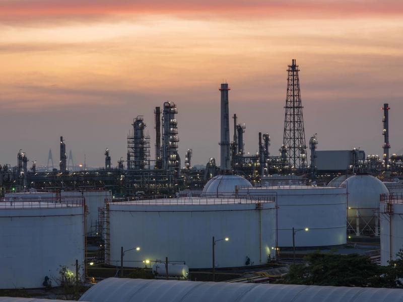 oil refinery at dusk