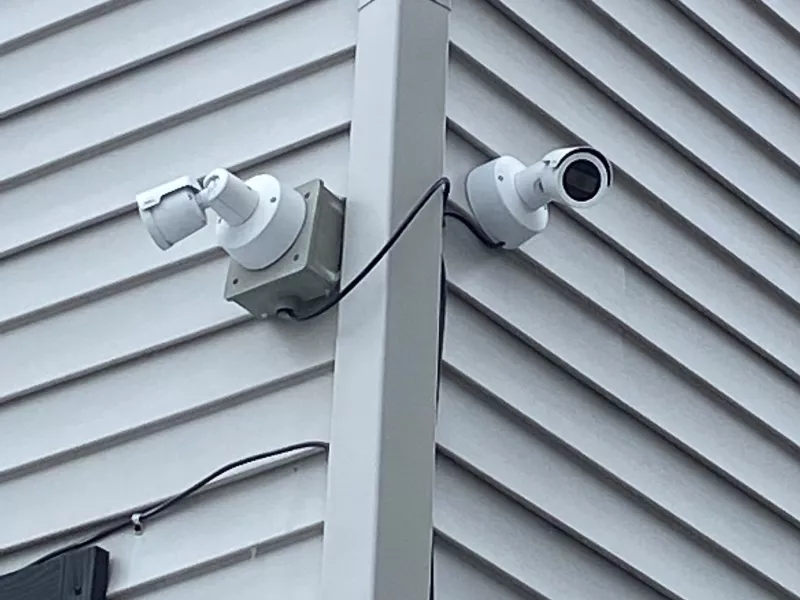 Close up of bullet cameras on corner of building