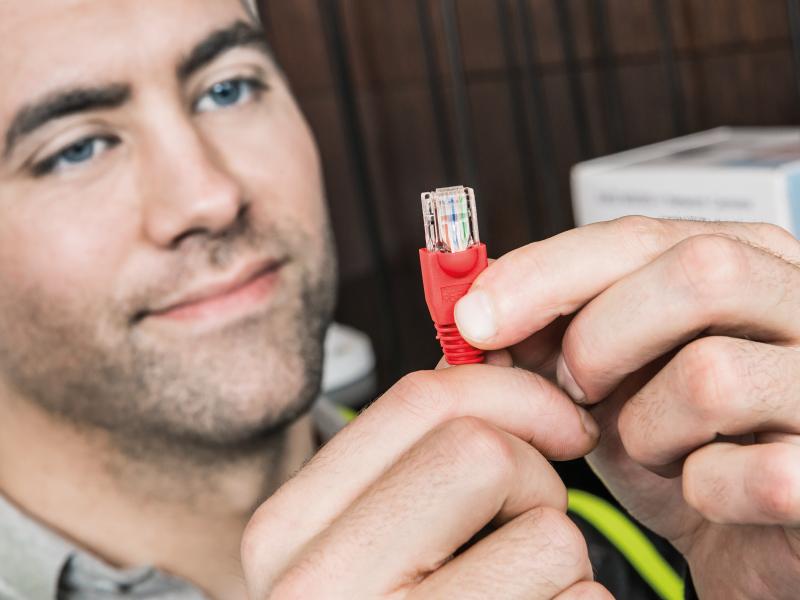 person holding wire in his hand