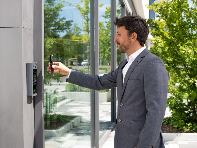 Man using phone to access door