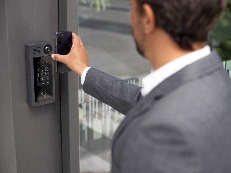 Man using phone to access door