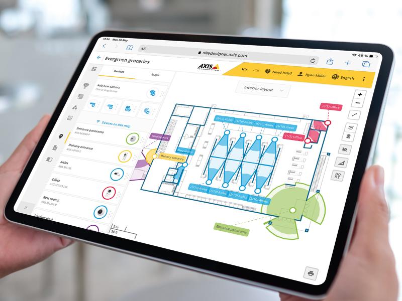 Tablet in hands with AXIS Site Designer running