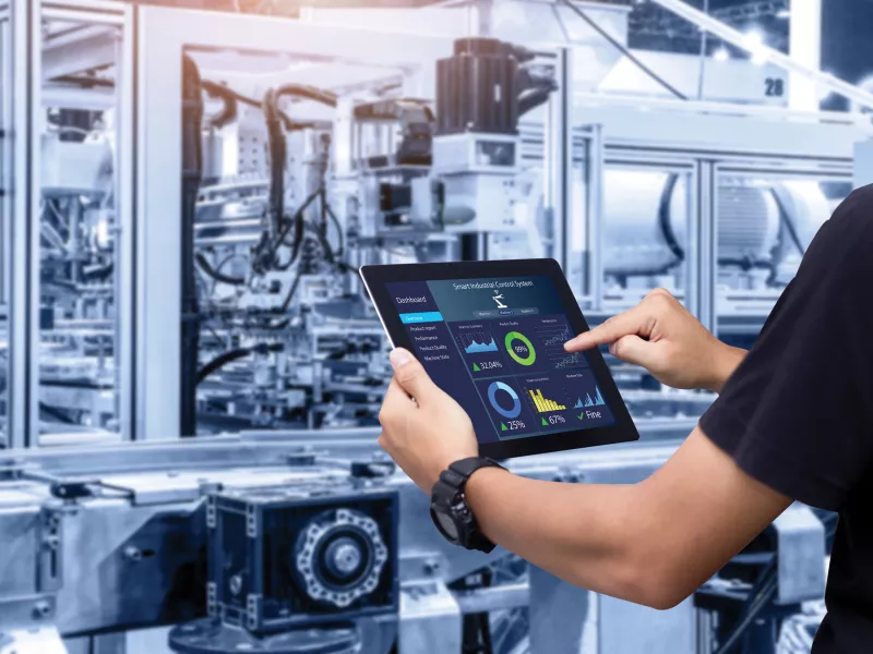 Person holding a tablet in their hands