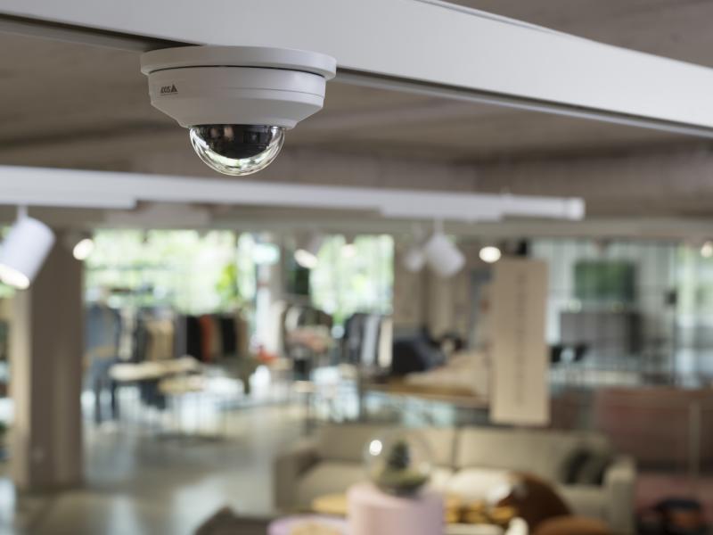 AXIS M3086-V Dome Camera, mounted in the celing in a retail store