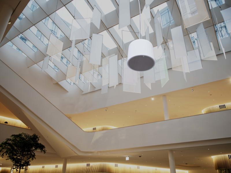AXIS C1510 Network Pendant Speaker, mounted in the ceiling in an office building