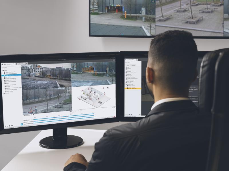 operator sitting in front of a computer screen