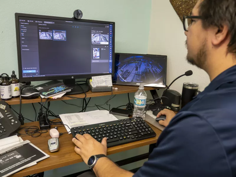 staff member using search tool on ACS