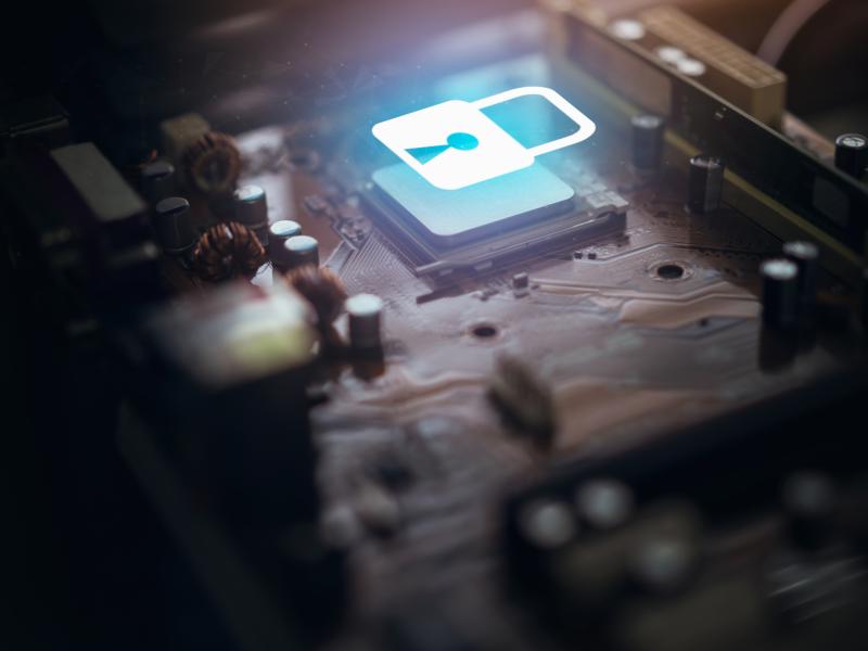 cybersecurity padlock illustration over circuitboard socket