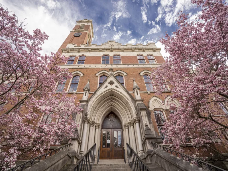 Exterior of Vanderbilt University building with flowering trees