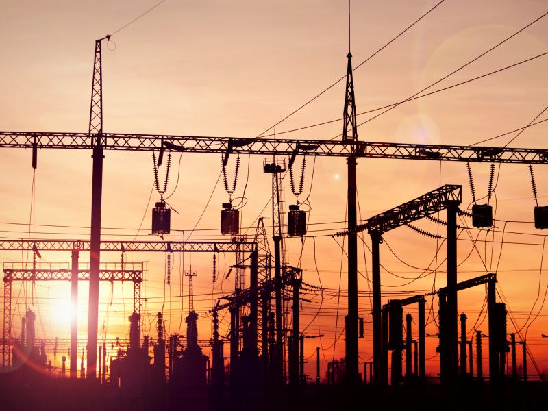 Electrical substation equipment in sunset