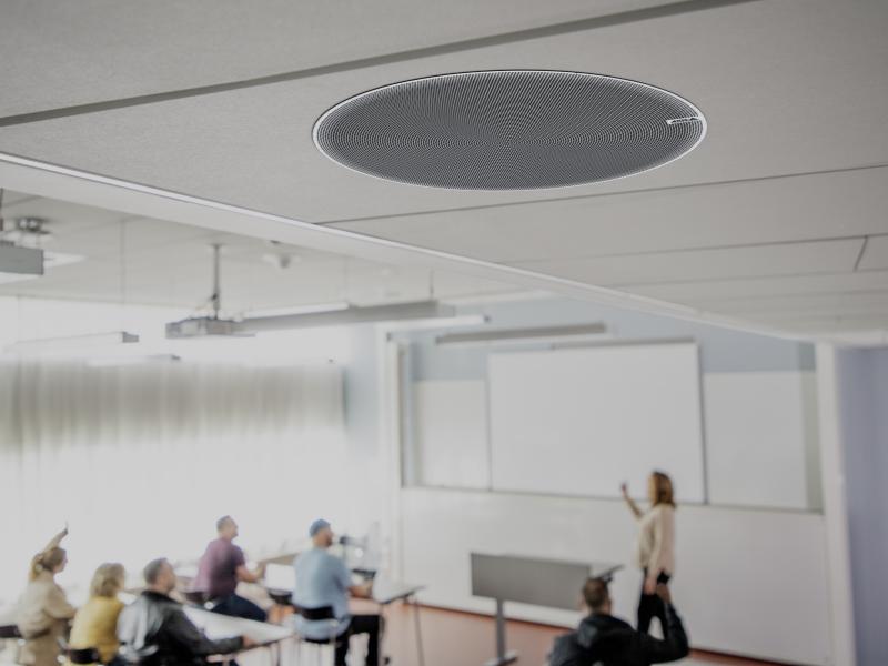 AXIS C1219-E placed in the ceiling in a classroom