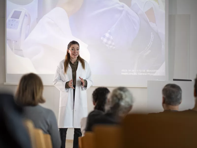 doctor giving presentation 03