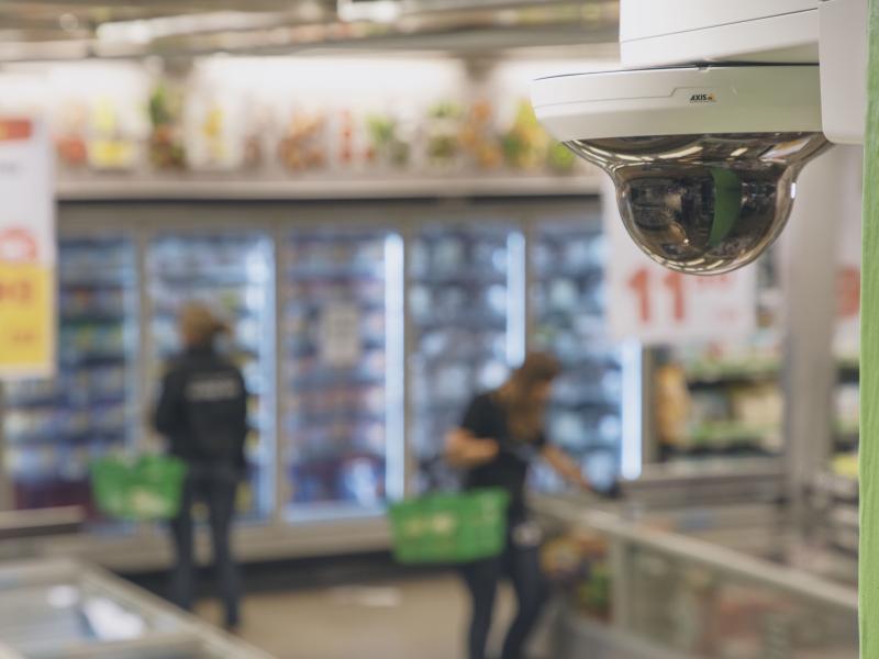 camera mounted on pillar in grocerystore