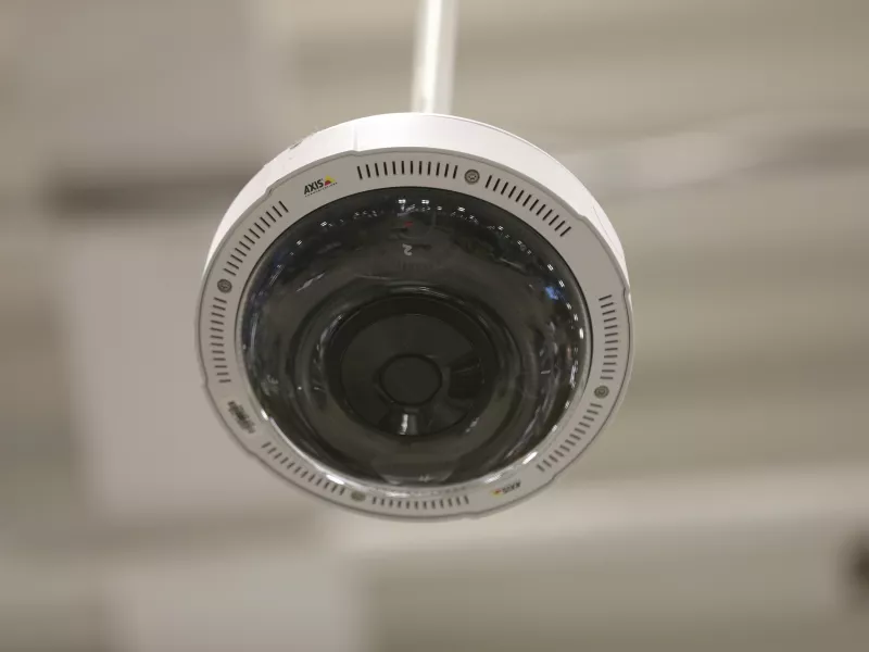 Close up of camera hanging from ceiling at Lowe's