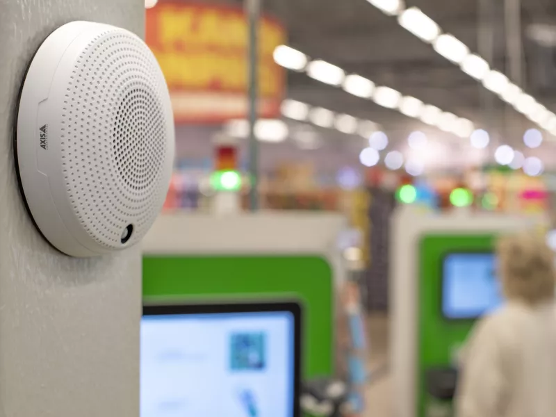 c1410 mounted on the wall in a grocery store