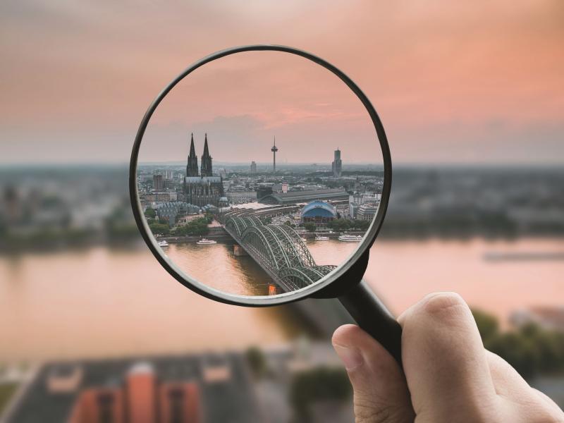 city viewed through a magnifying glass