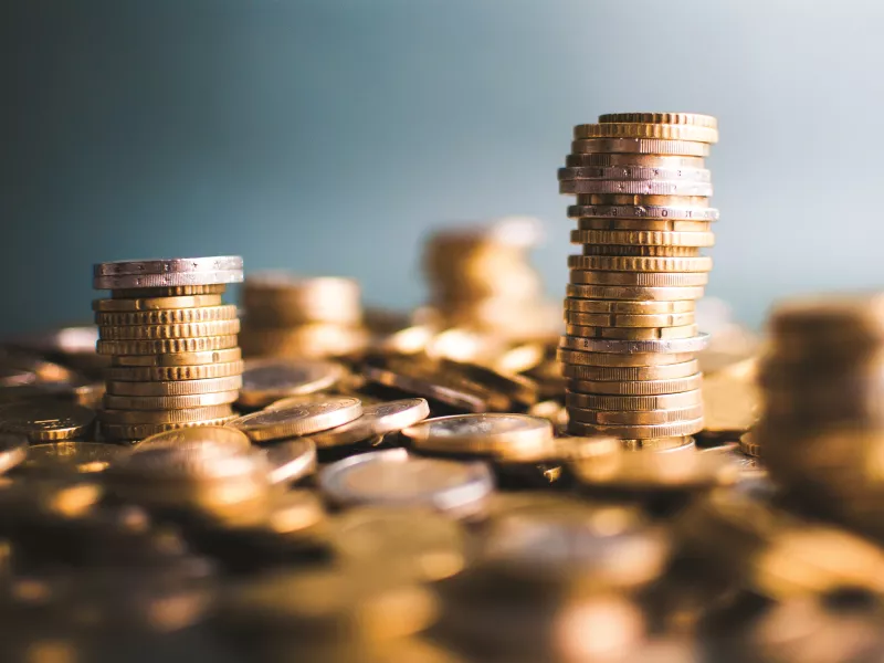 Coins money stacked piles 