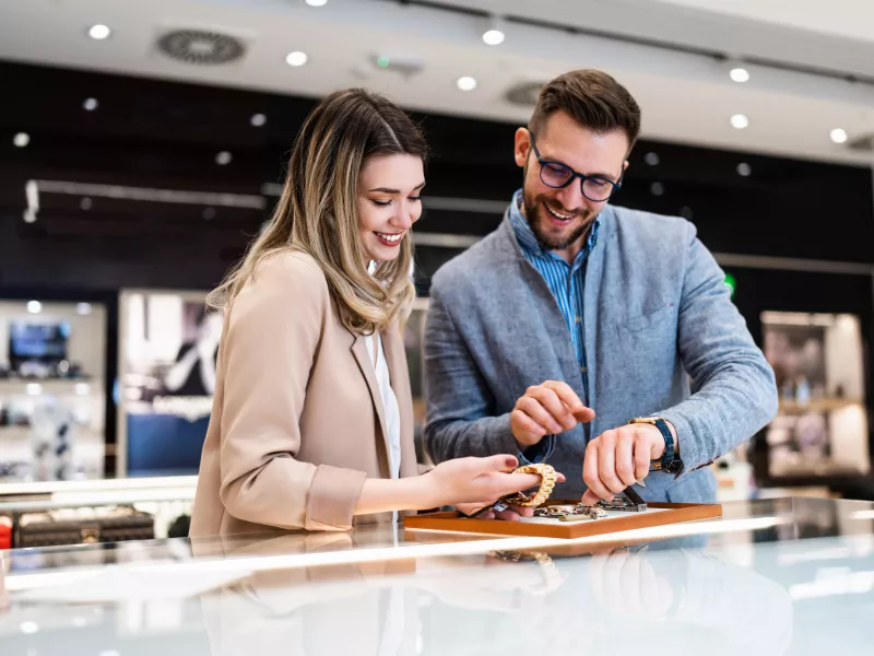 man woman jewelry store 