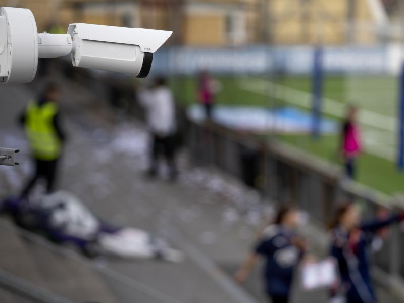 Surveillance camera mounted in football stadium 