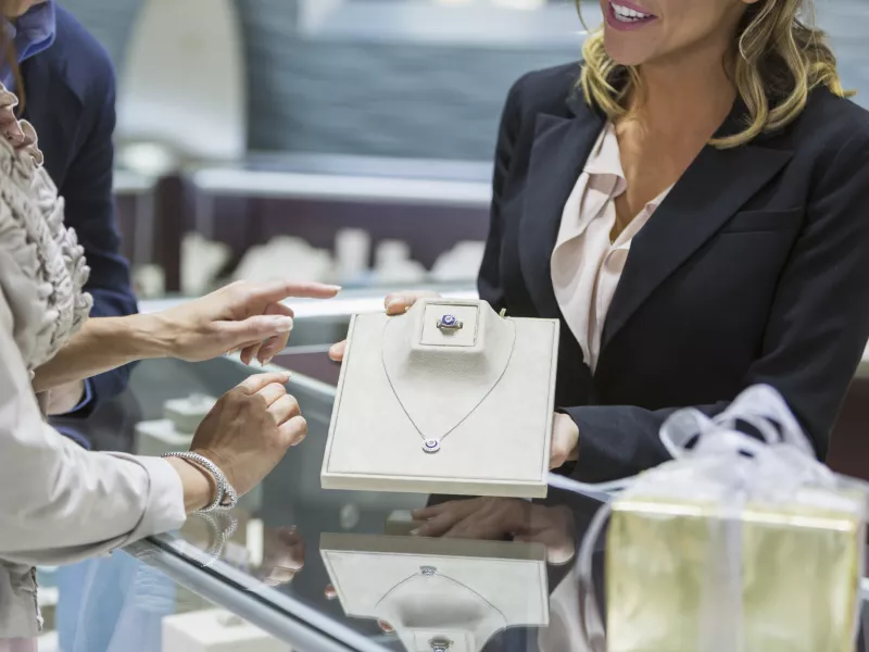 Saleswoman customer jewelry store