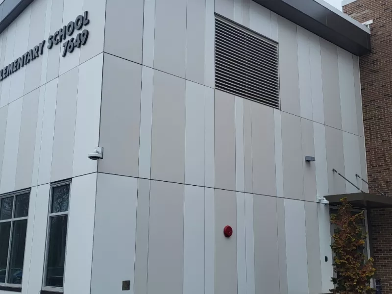 Exterior camera on corner of school building