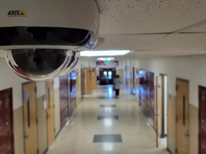 Ceiling camera in school hallway